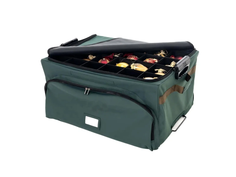 Green polyester Christmas ornament keeper with acid-free fabric lining, 3 detachable storage trays, self-support steel frame, front accessory pocket and padded transport handles for up to 4 inch ornaments